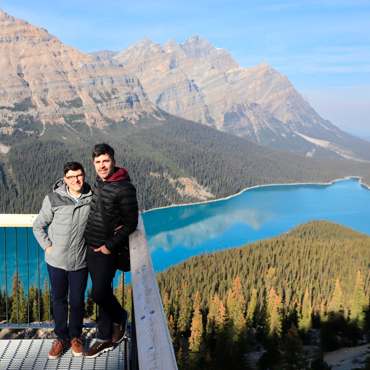 Robson and Thiago with the stunning turquoise water of the Peyton Lake in the background.